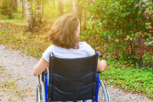 woman in wheelchair outside