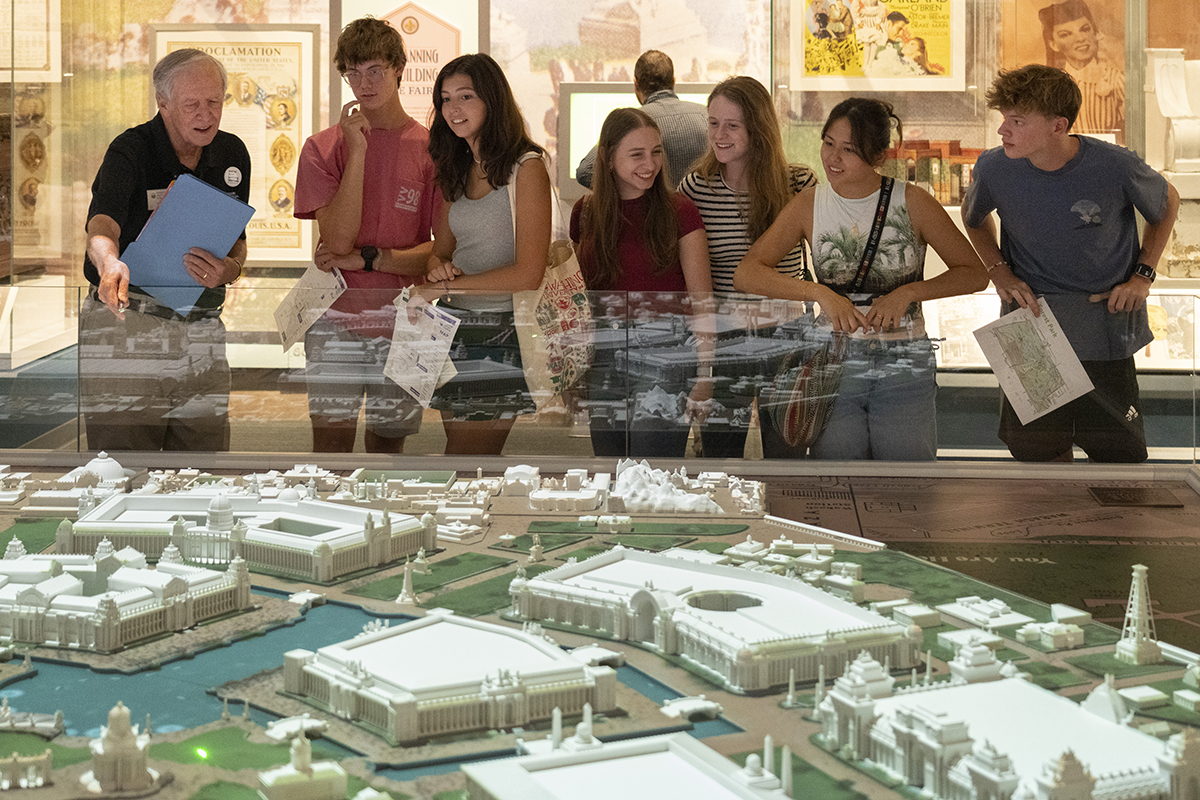 students look at exhibit