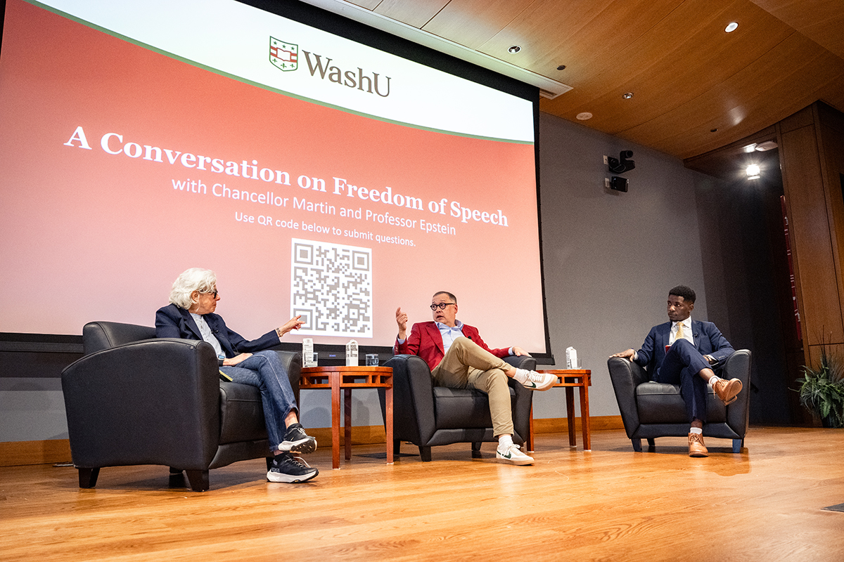 Hussein Amuri moderates conversation between Chancellor Martin and Lee Epstein 