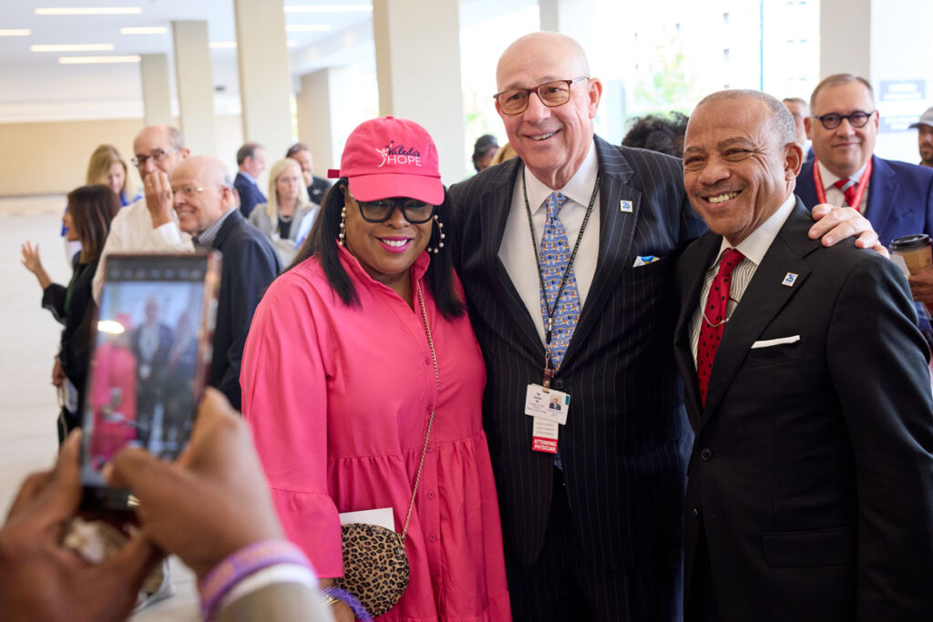 Timothy Eberlein (center) with Valeda Keys and Melive A. Shahid Sr.