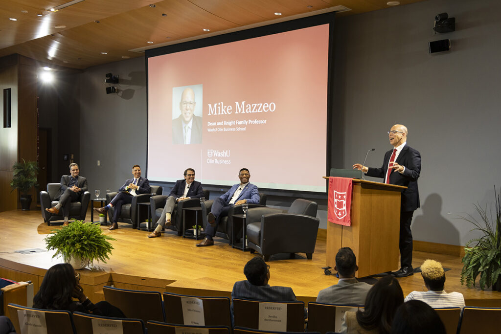 Panelists engage in discussion