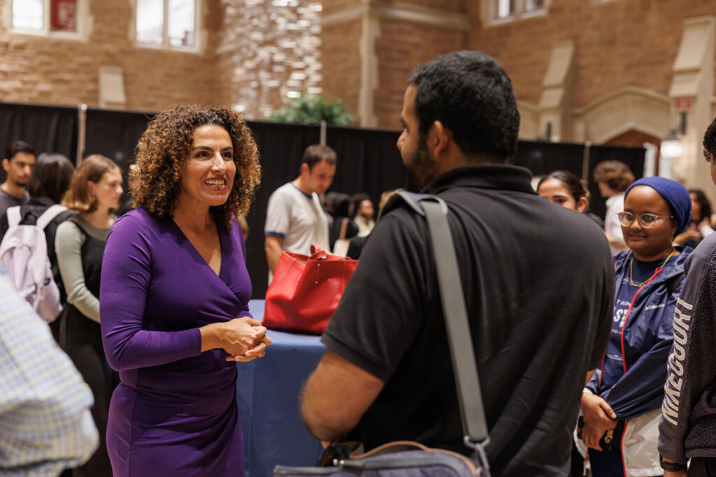 Professor meets with audience members