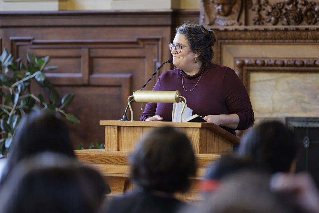 Author Carmen Maria Machado reads at podium