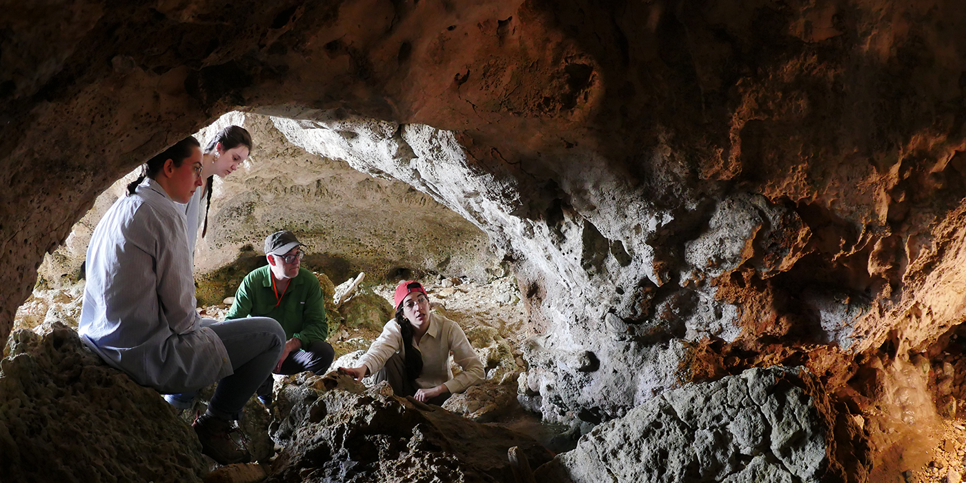 WashU archaeologists in cave