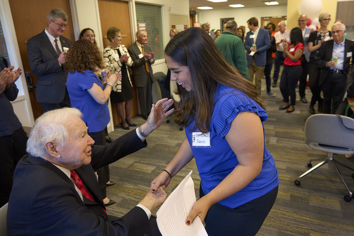 Student shakes hands