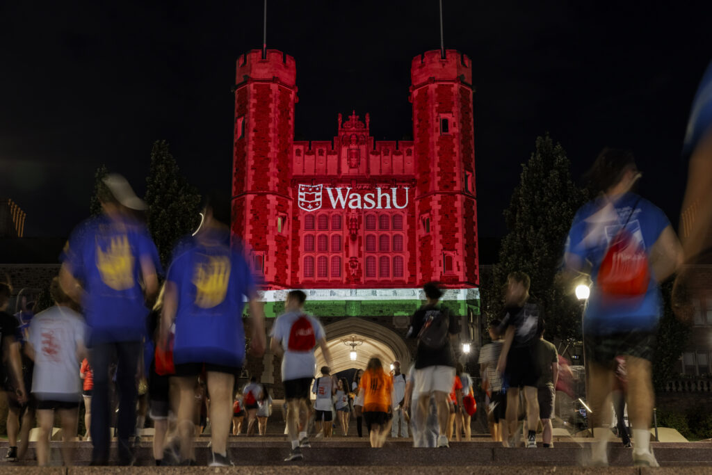 Following Convocation Aug. 24, new WashU students enjoyed a party in Tisch Park with a concert, food and a Brookings Hall lighting showcasing the new WashU logo. (Photo: Whitney Curtis)