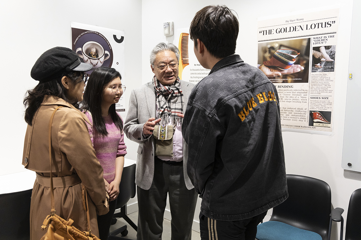 people engage in conversation at studio