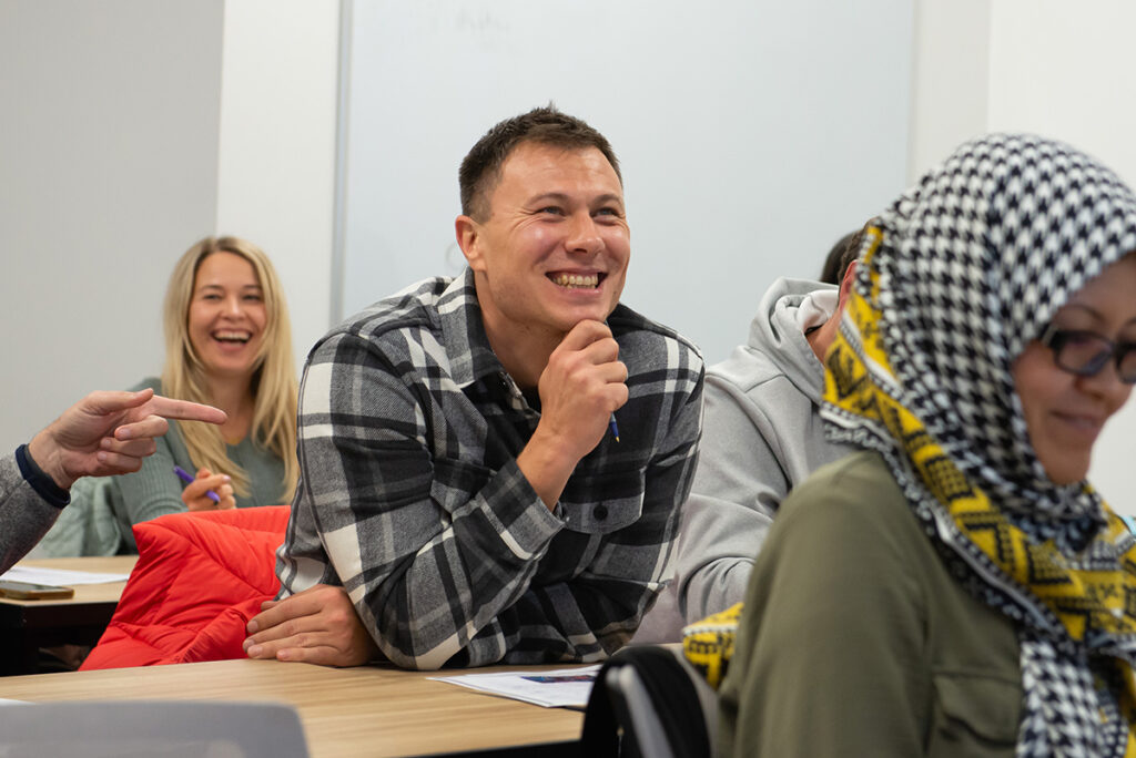 Student smiles in class