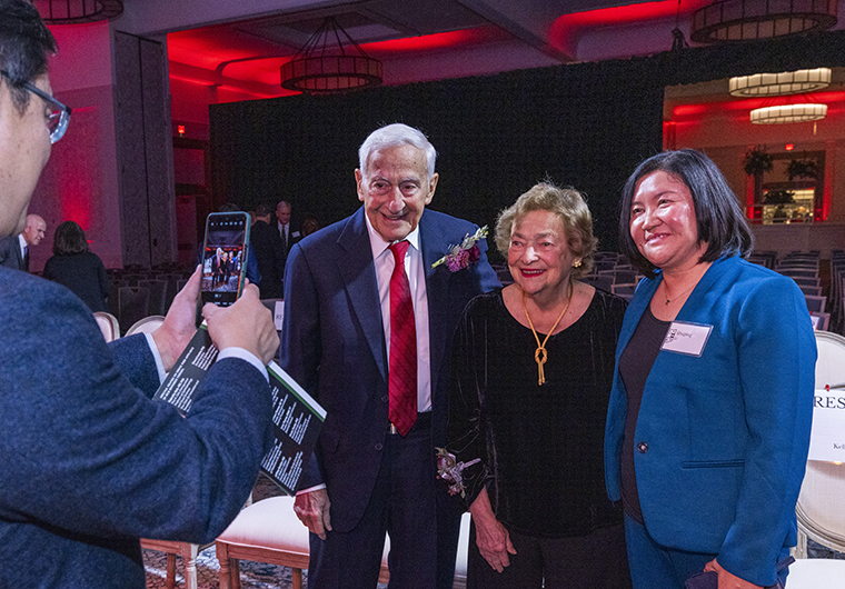 Roy and Diane Vagelos get their picture taken with (Need name) at Founders Day.