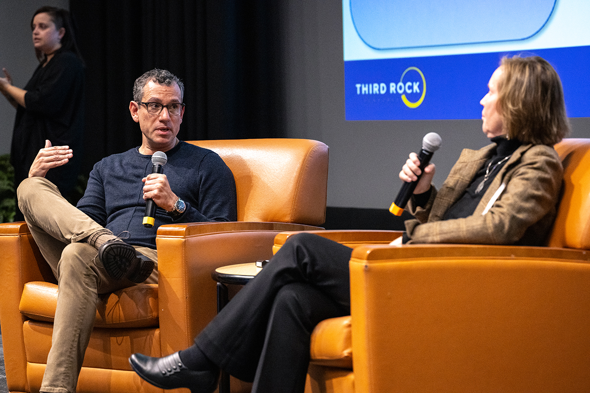 David Kaufman (left),  speaks with WashU Medicine's Larissa Thackray