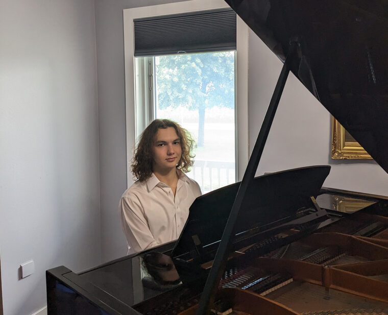 Ardan Carlisle at a piano