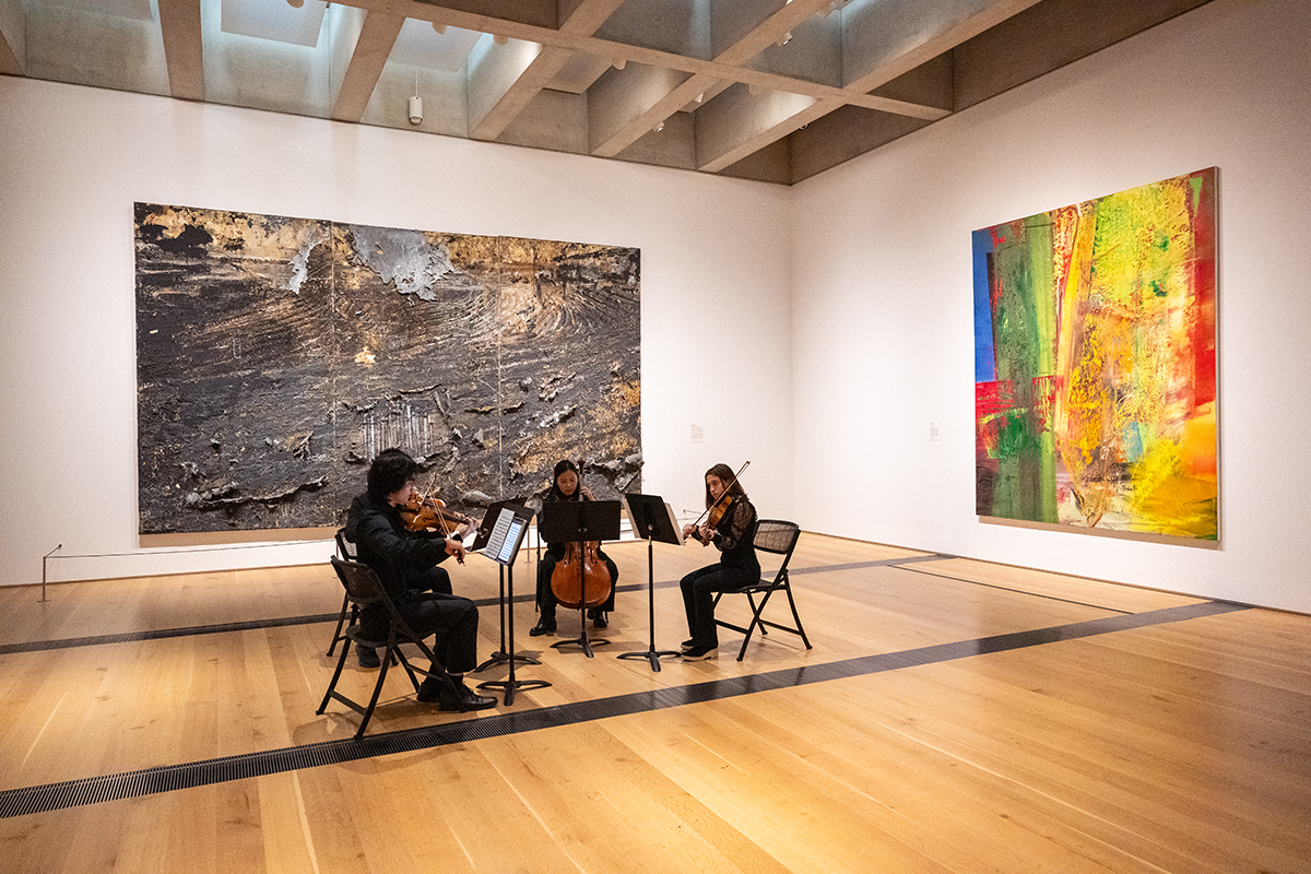 Musicians performs at a museum