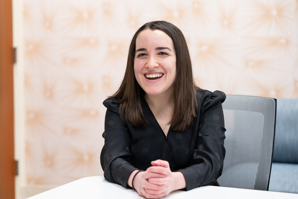 an image of Payton Rule sitting at a table