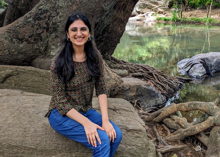 Shivani Shenoy, an illustrator and graduate student in the Sam Fox School, conducts research in University Archives. (Courtesy photo