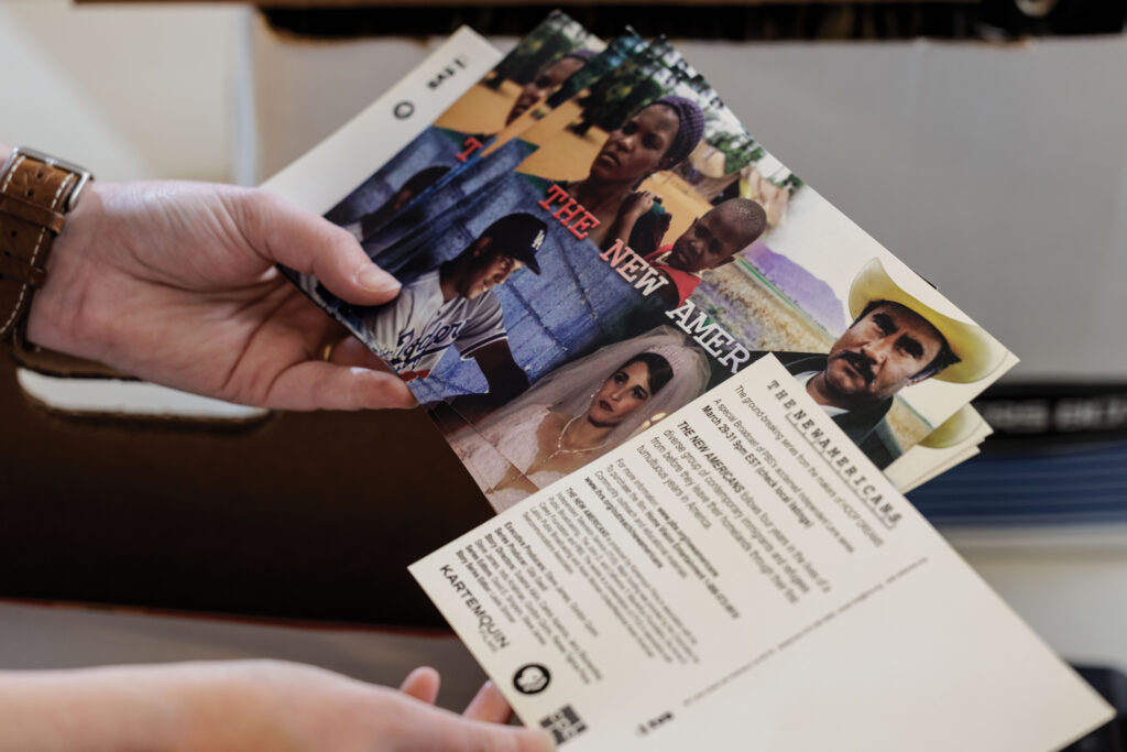 Among the 440 boxes of ephemera — film posters, storyboards, promotional photos, soundtrack albums and other special items created for the release of new films — is background for the 7-part series <i>The New Americans</i>. (Photo: Whitney Curtis/WashU)