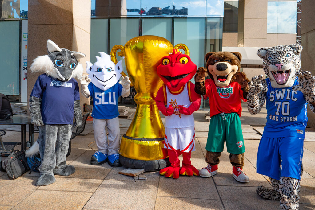 College mascots pose for a photo
