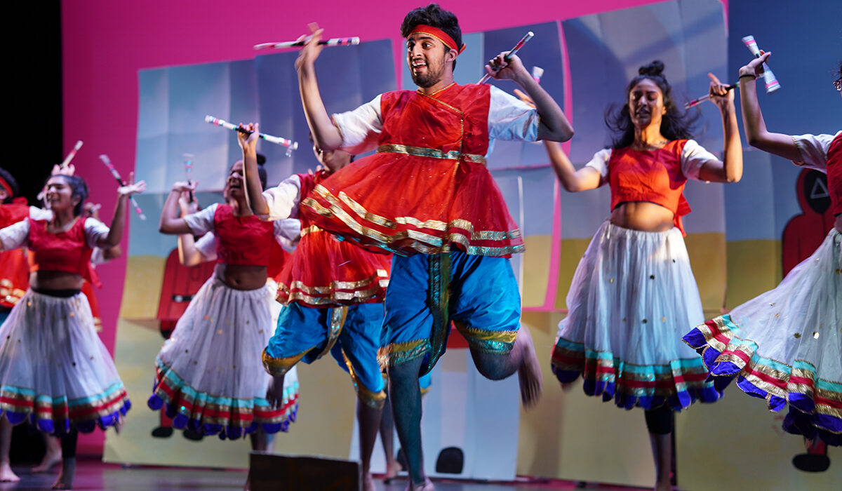 Students dancing a traditional South Asian dance at Diwali