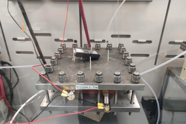 Inexpensive materials transform waste carbon into energy-rich compounds