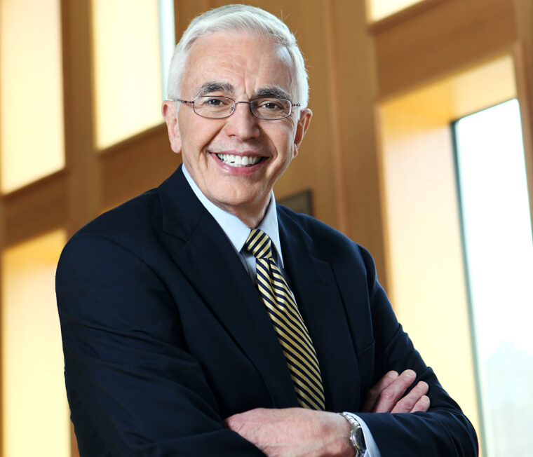 a profile pic of an older man smiling