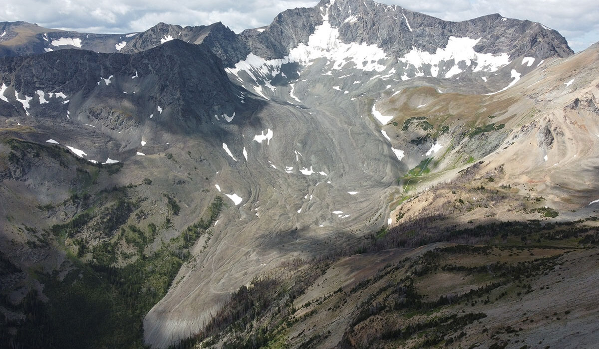 The remaining ice of Sunlight Glacier can be seen in an aerial shot of the mountains