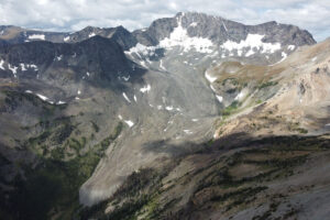 The remaining ice of Sunlight Glacier can be seen in an aerial shot of the mountains
